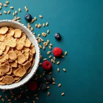 A bowl of Wheaties cereal with fresh berries highlighting its nutritional value